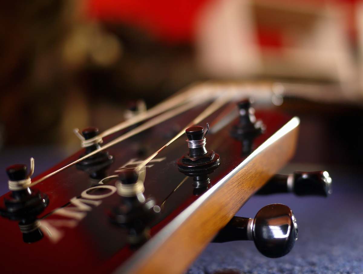 musical instrument brown guitar close-up photography leisure activities